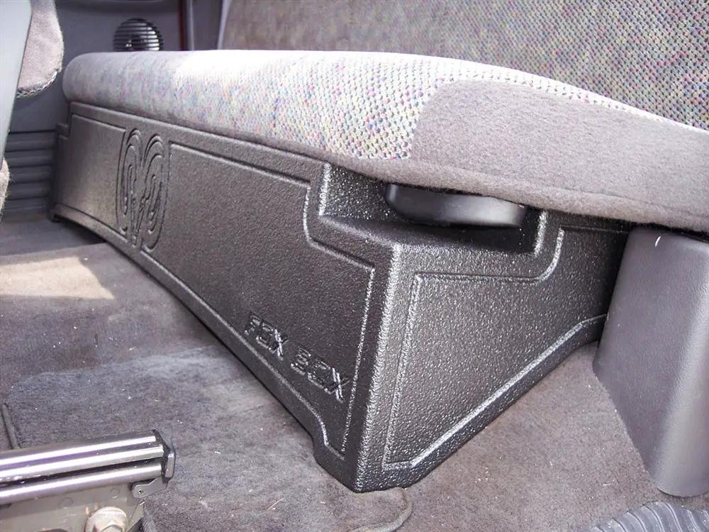 FOX BOX enclosure installed beneath a fabric rear bench seat, with its front face visible