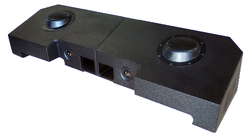 Underside of the Fox Box GM enclosure showing two rounded clearance sections, central ports and connection terminals