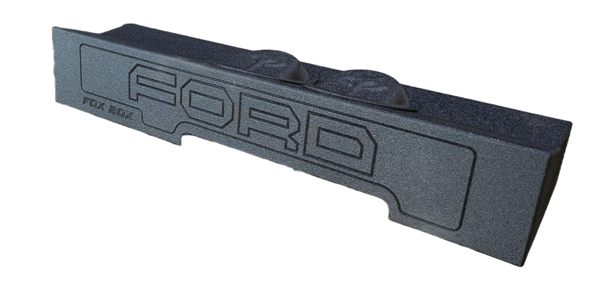 Fox Box enclosure with FORD lettering and two raised circular sections, angled front view