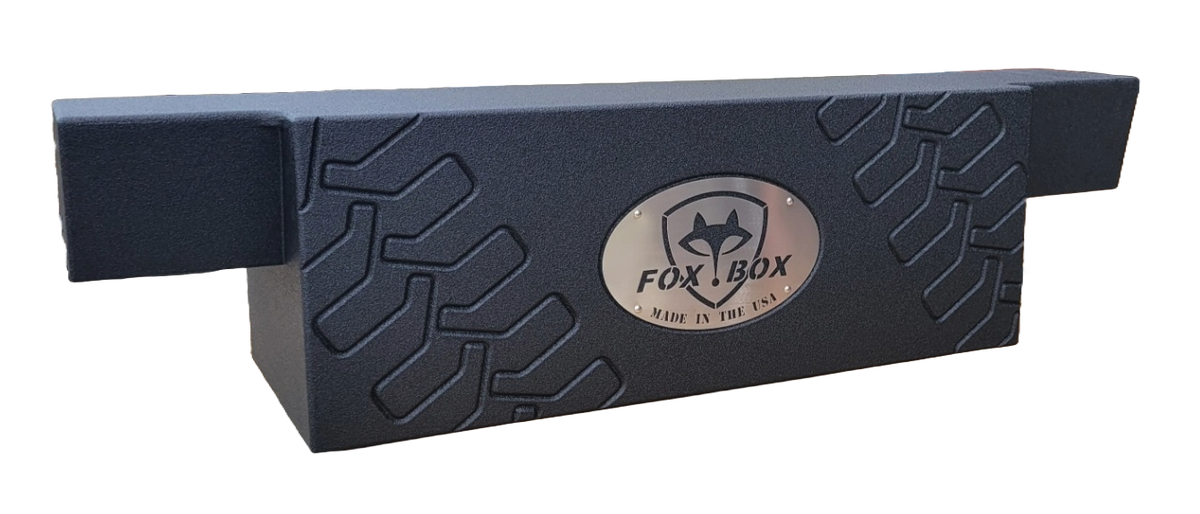 Fox Box subwoofer enclosure with a tire-tread pattern and central logo, front view