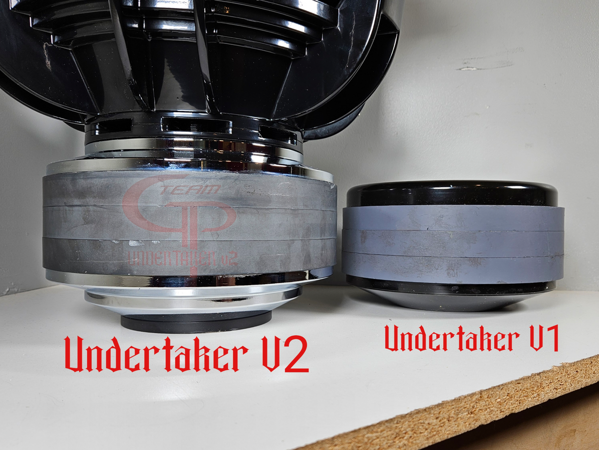 Side-by-side comparison of the larger Team GP Undertaker V2 subwoofer motor and the Undertaker V1 motor