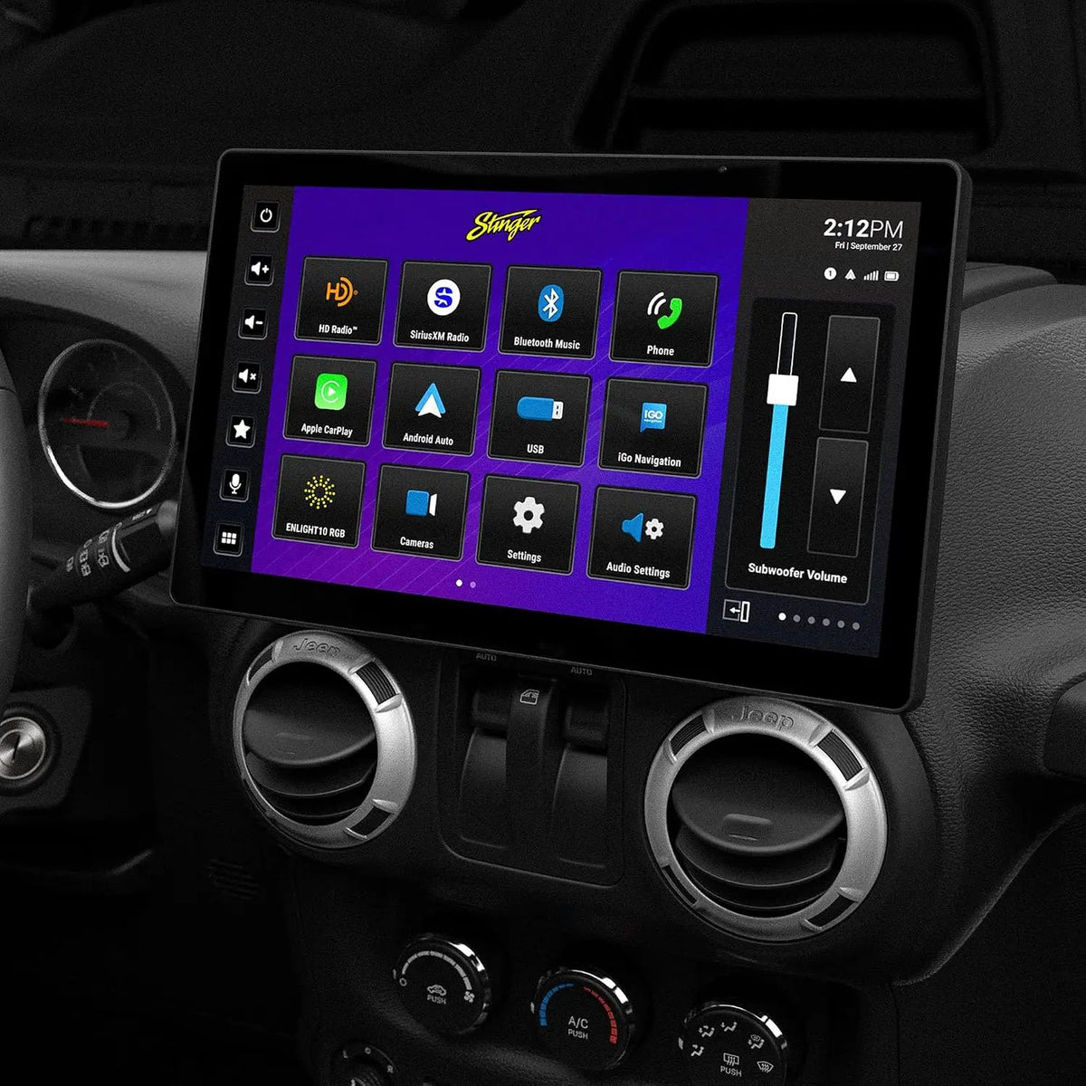 Stinger HORIZON12 installed above the round dashboard vents in a Jeep, showing home-screen apps and a volume slider
