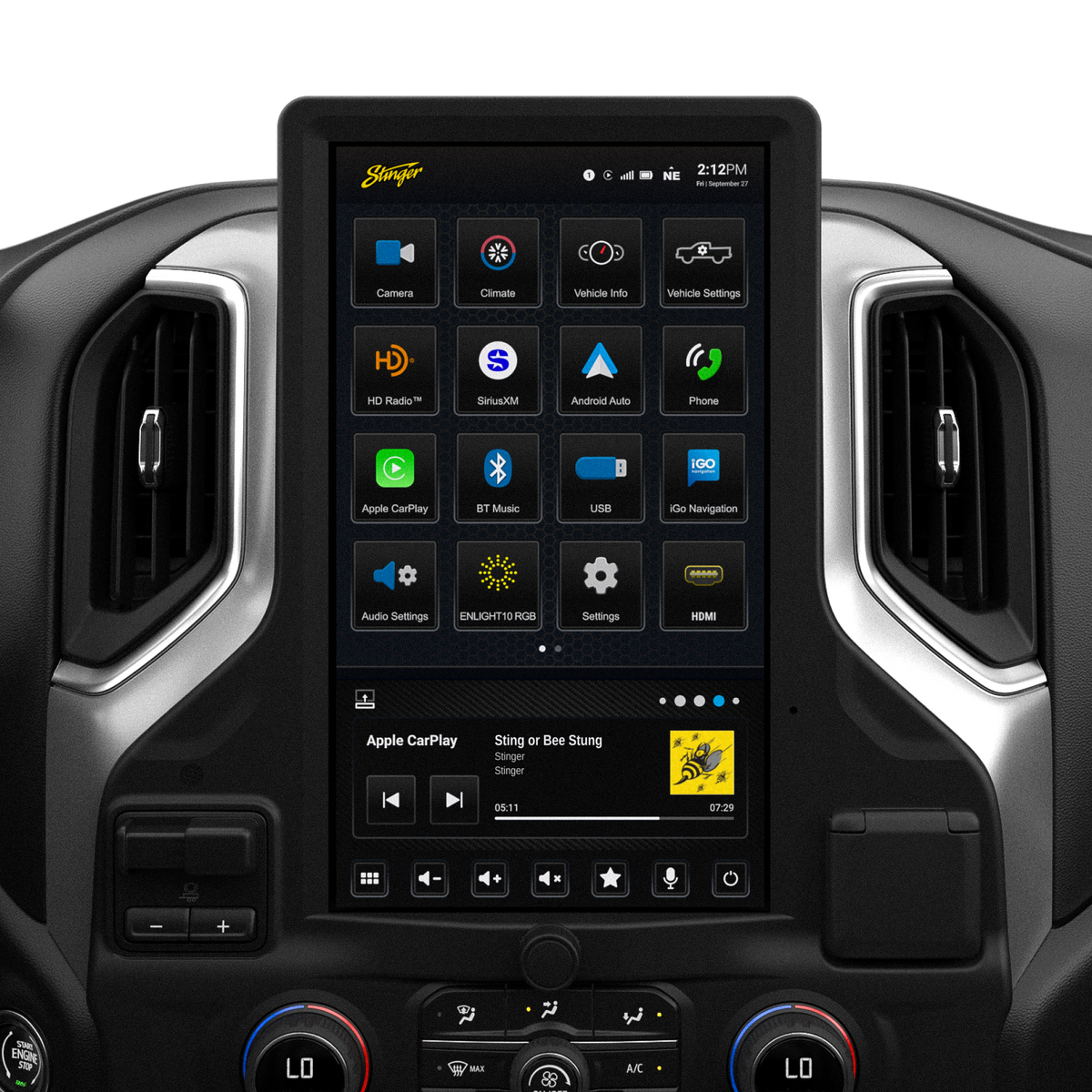 Tall Stinger touchscreen installed between dashboard vents, showing app icons above Apple CarPlay music controls