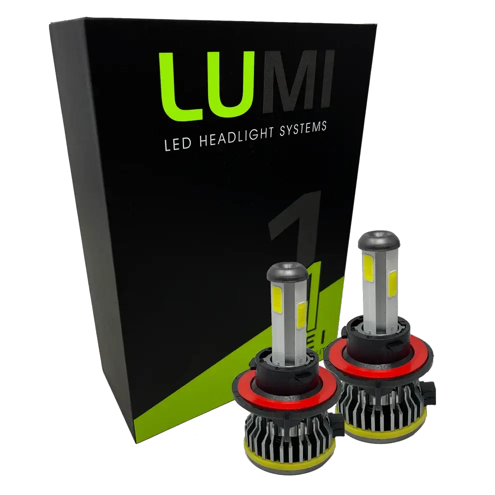 Two LUMI Stage 1 H13 LED headlight bulbs from Lumi, each rated at 40 Watts and featuring red and black heat sinks, are displayed in front of a black and green box labeled “LUMI LED Headlight Systems.†These bulbs offer a bright 6000K color temperature and include advanced LED CANBUS technology for enhanced compatibility.