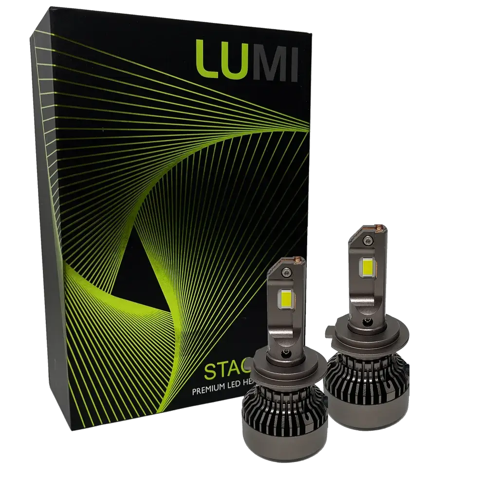Two Lumi Stage 3 H7 LED headlight bulbs, equipped with advanced CSP chips and offering a bright 6000K color temperature, are displayed in front of a black box accented with green lines and the LUMI logo. The packaging also features the text “STACK†and “Premium LED Headlights.â€.