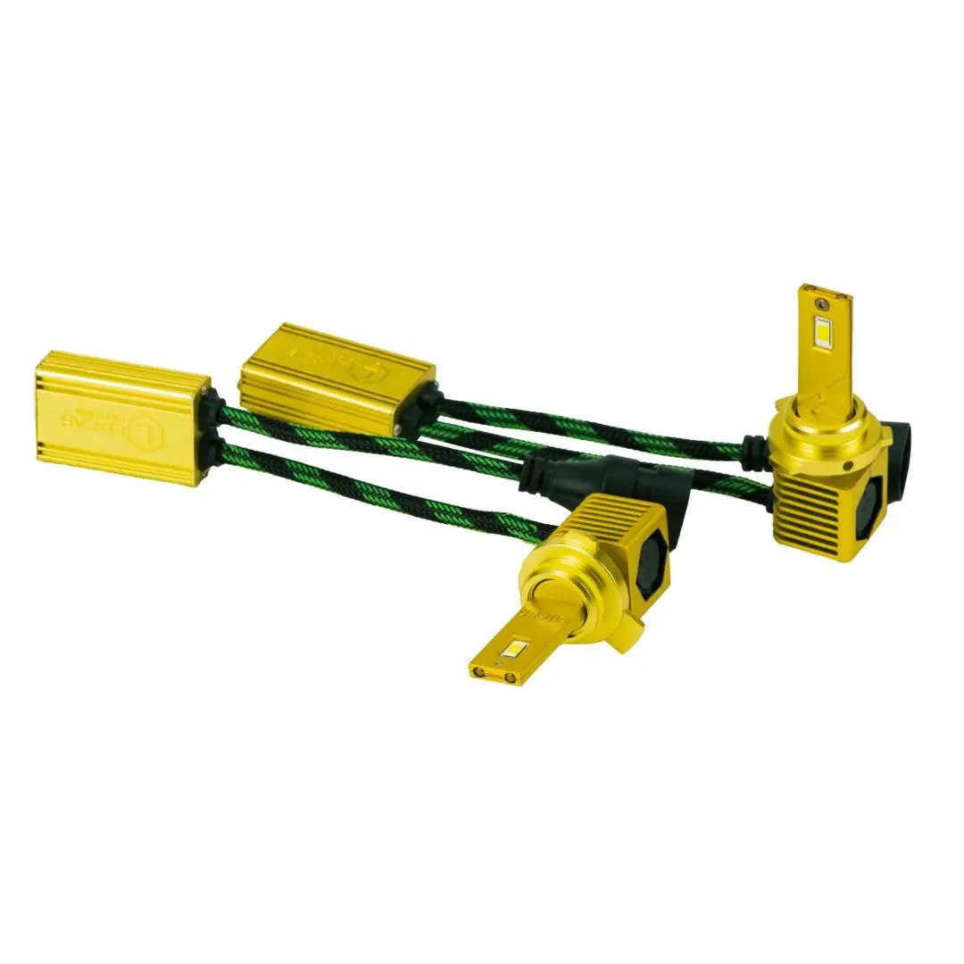 Gold LED bulb pair with square finned bases and braided leads connected to gold driver modules