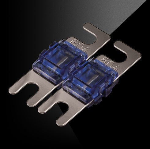 Two blue 60-amp mini fuses against a black background