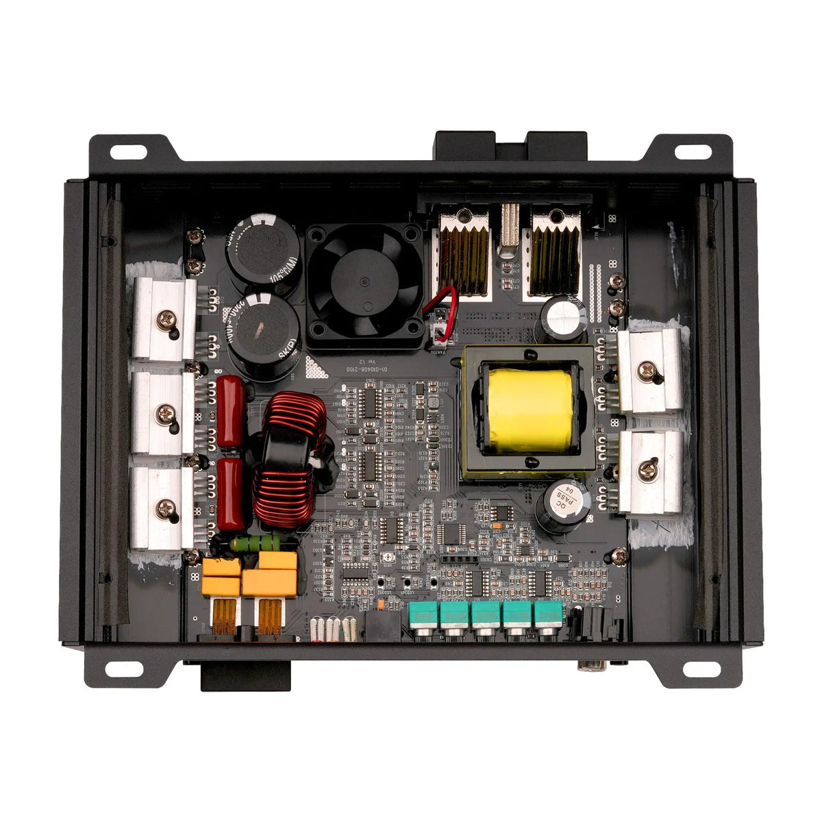 Open amplifier housing showing the circuit board, capacitors, coils, heat sinks and fan