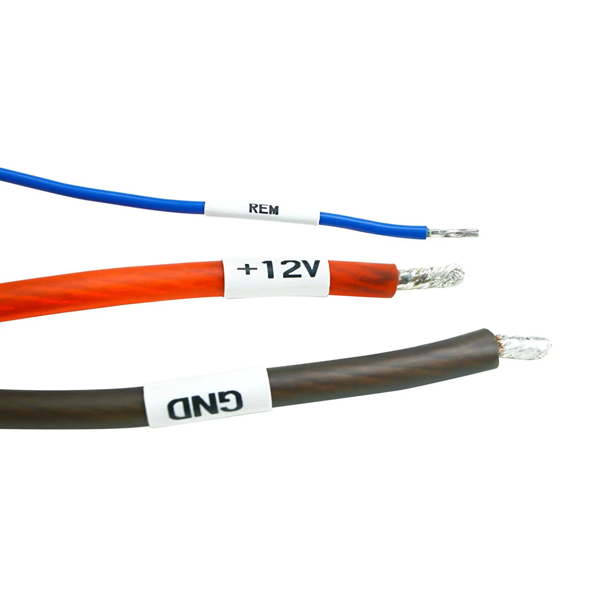 Amplifier wire close-up labeled REM, +12V and GND