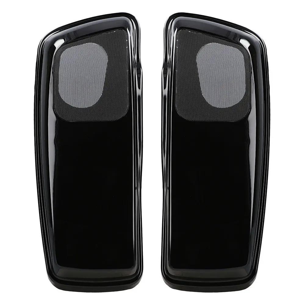 Top view of two glossy black saddlebag lids with mesh speaker grilles