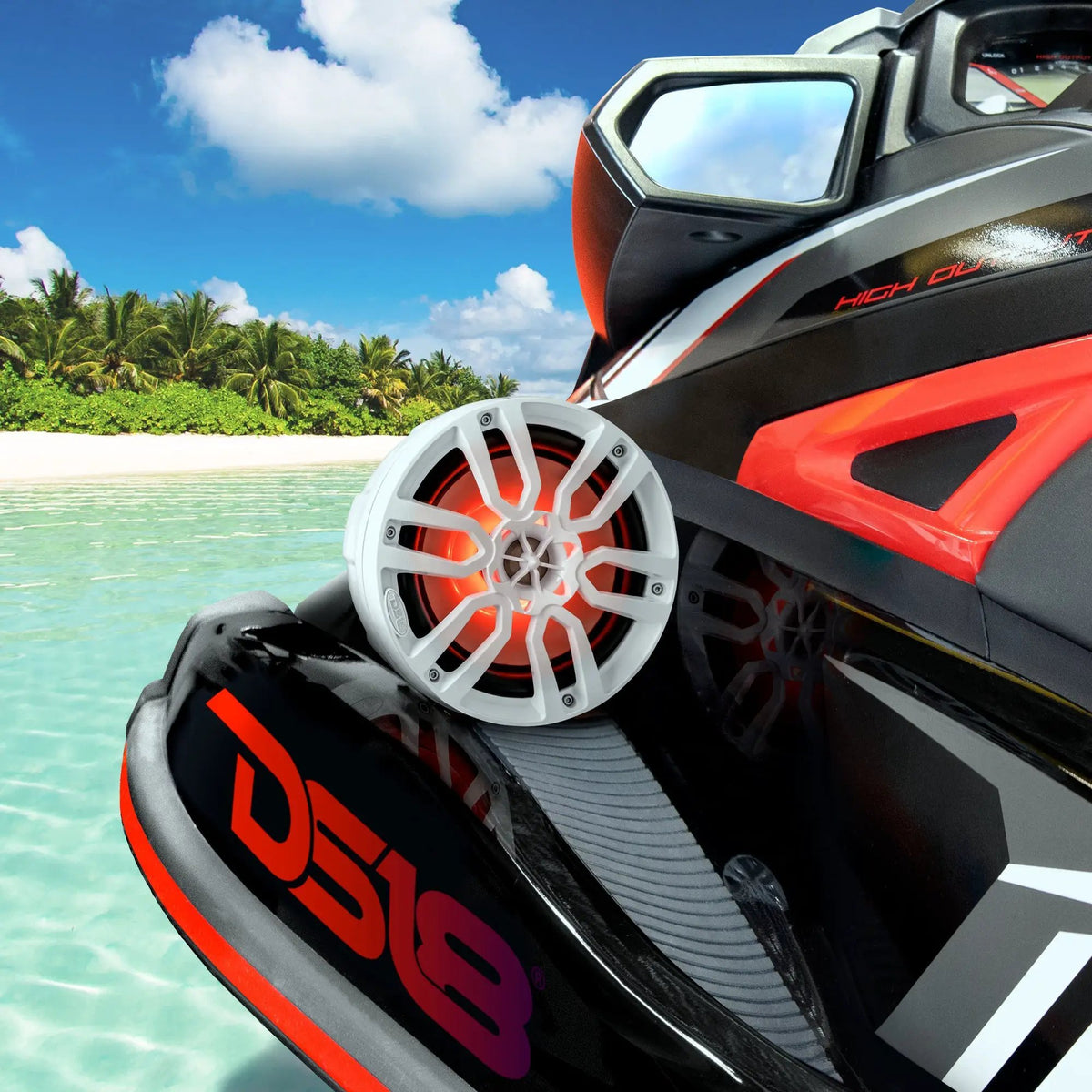 White speaker pod mounted beside the seat of a personal watercraft on turquoise water