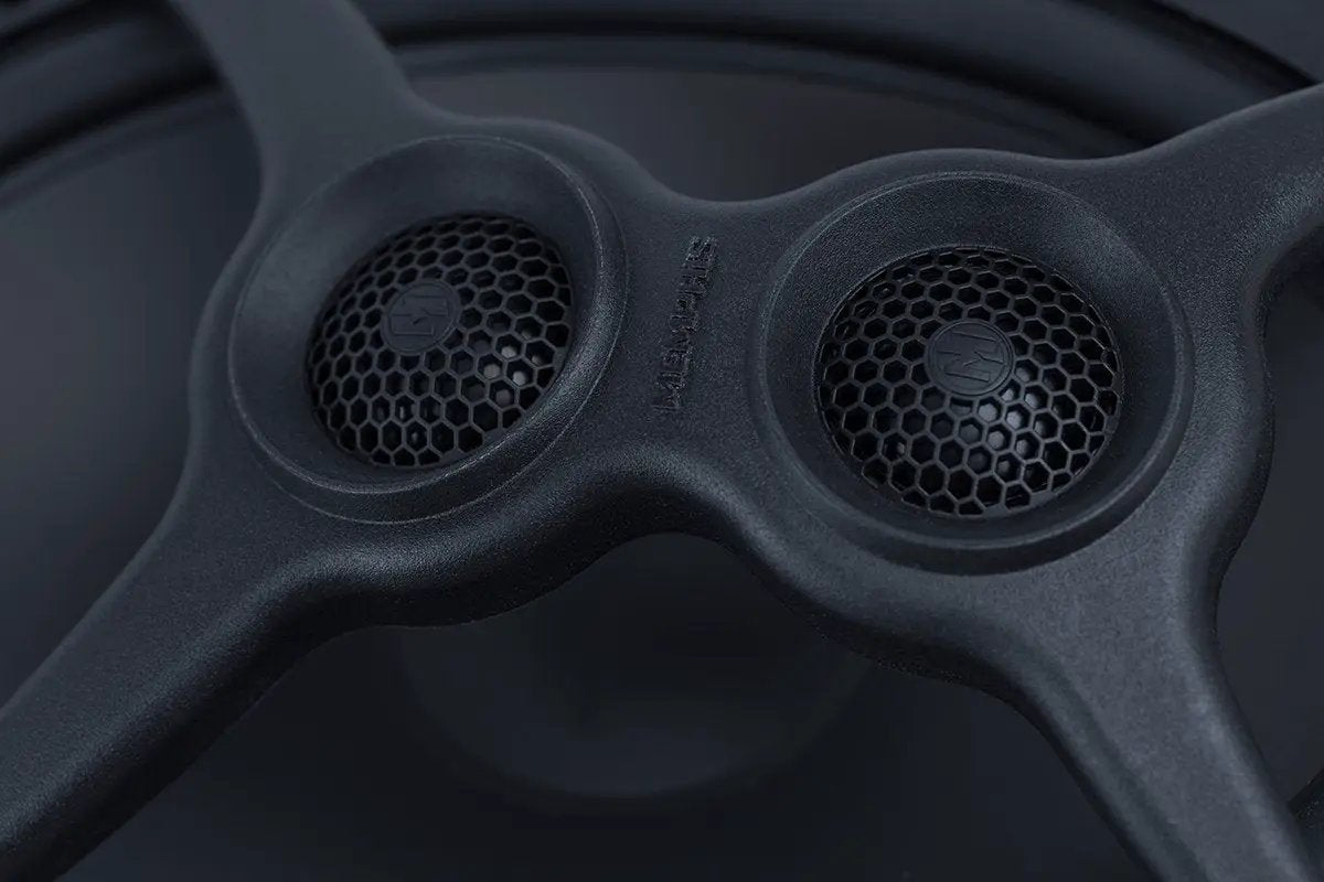 Close-up of an oval Memphis speaker with two mesh-covered tweeters