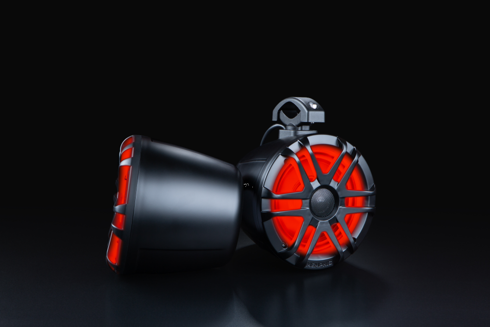 Pair of black Memphis speaker pods showing red-lit grilles and mounting clamps