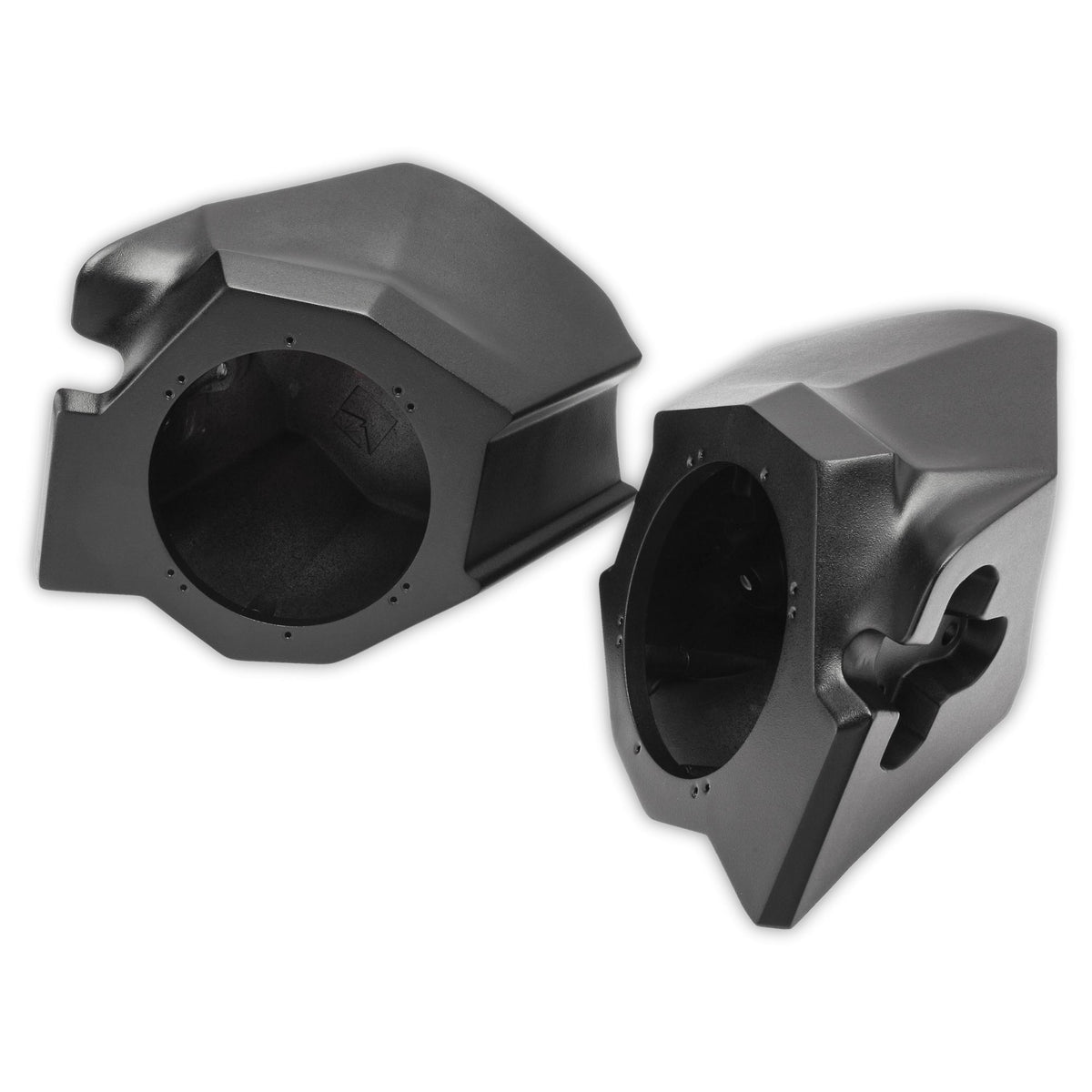 Angled view of two empty black molded speaker pods