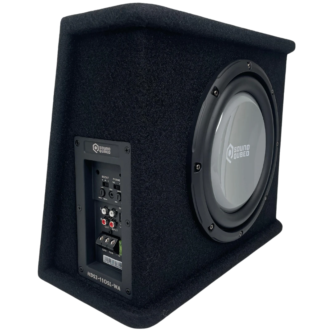 Angled view of a SoundQubed wedge enclosure showing the gray subwoofer cone and side amplifier controls