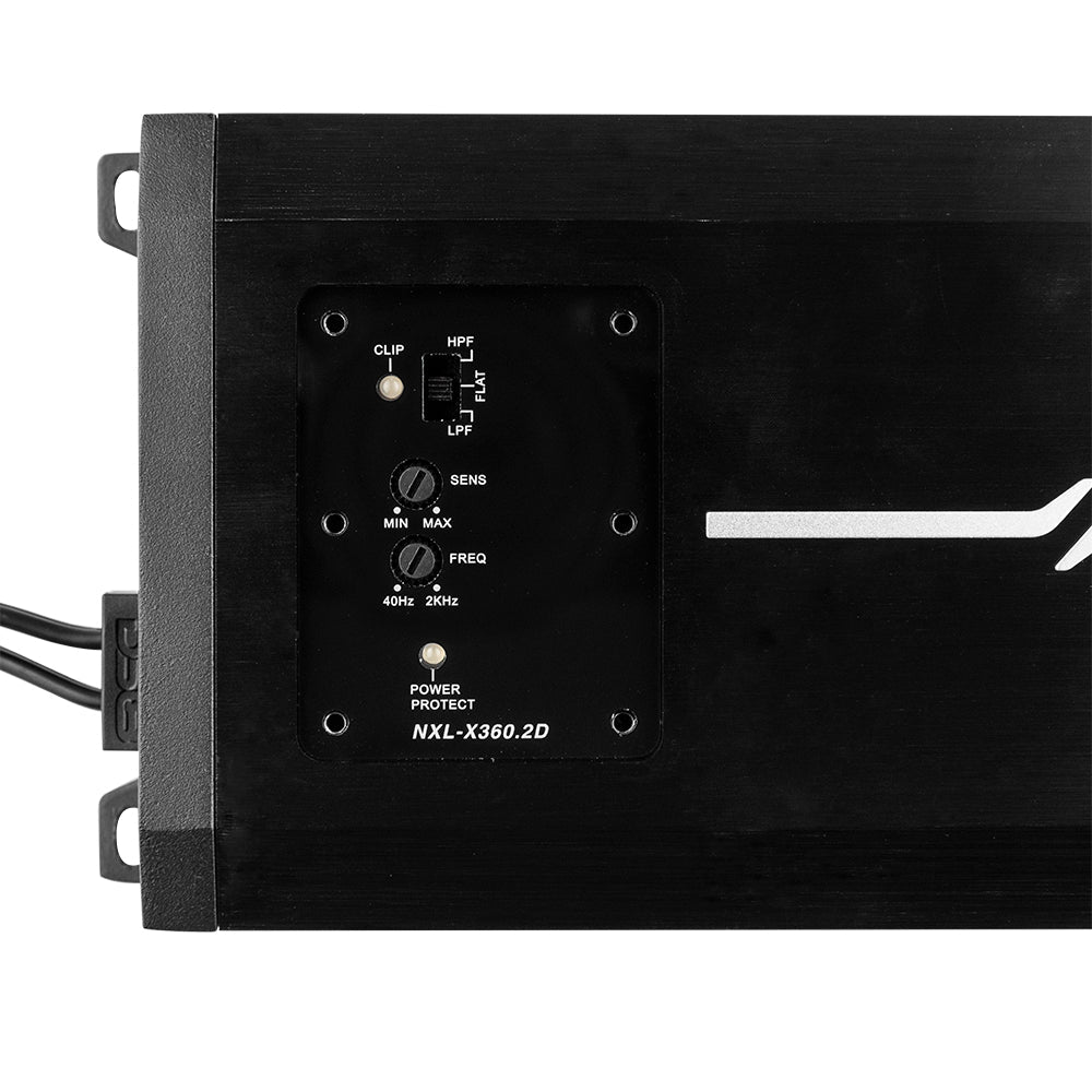 Close-up of the DS18 NXL-X360.2D amplifier controls, including filter selection, sensitivity, frequency and status indicators