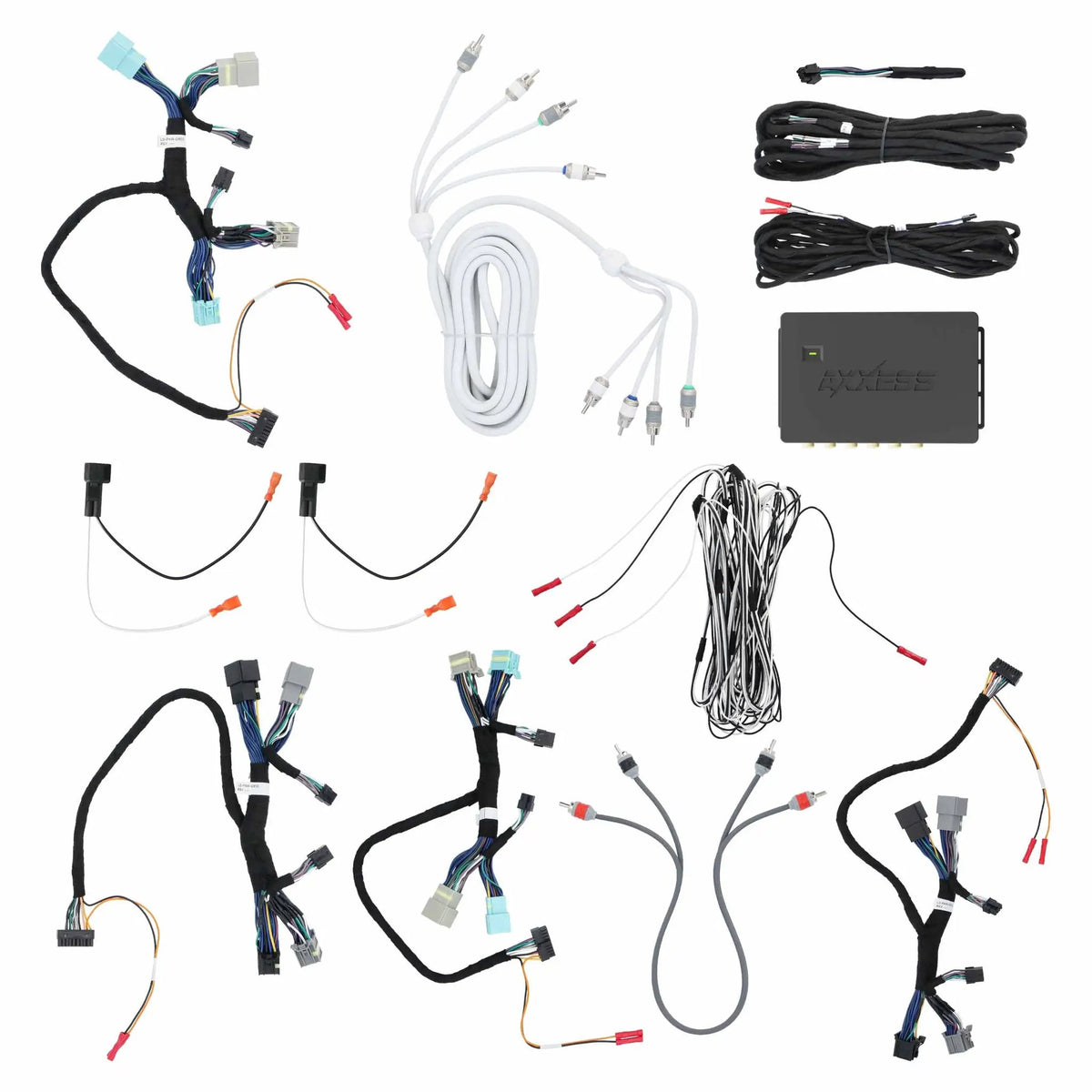 Axxess interface with wiring harnesses, white RCA cables, speaker adapters and black accessory leads