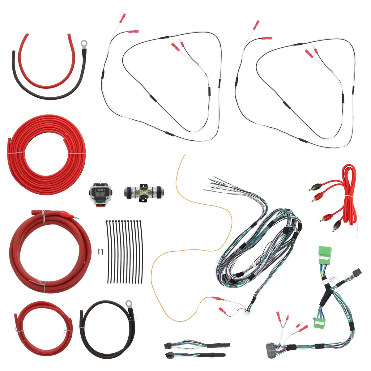 Wiring harnesses, red power cables, RCA leads, fuse holder and cable ties arranged on white