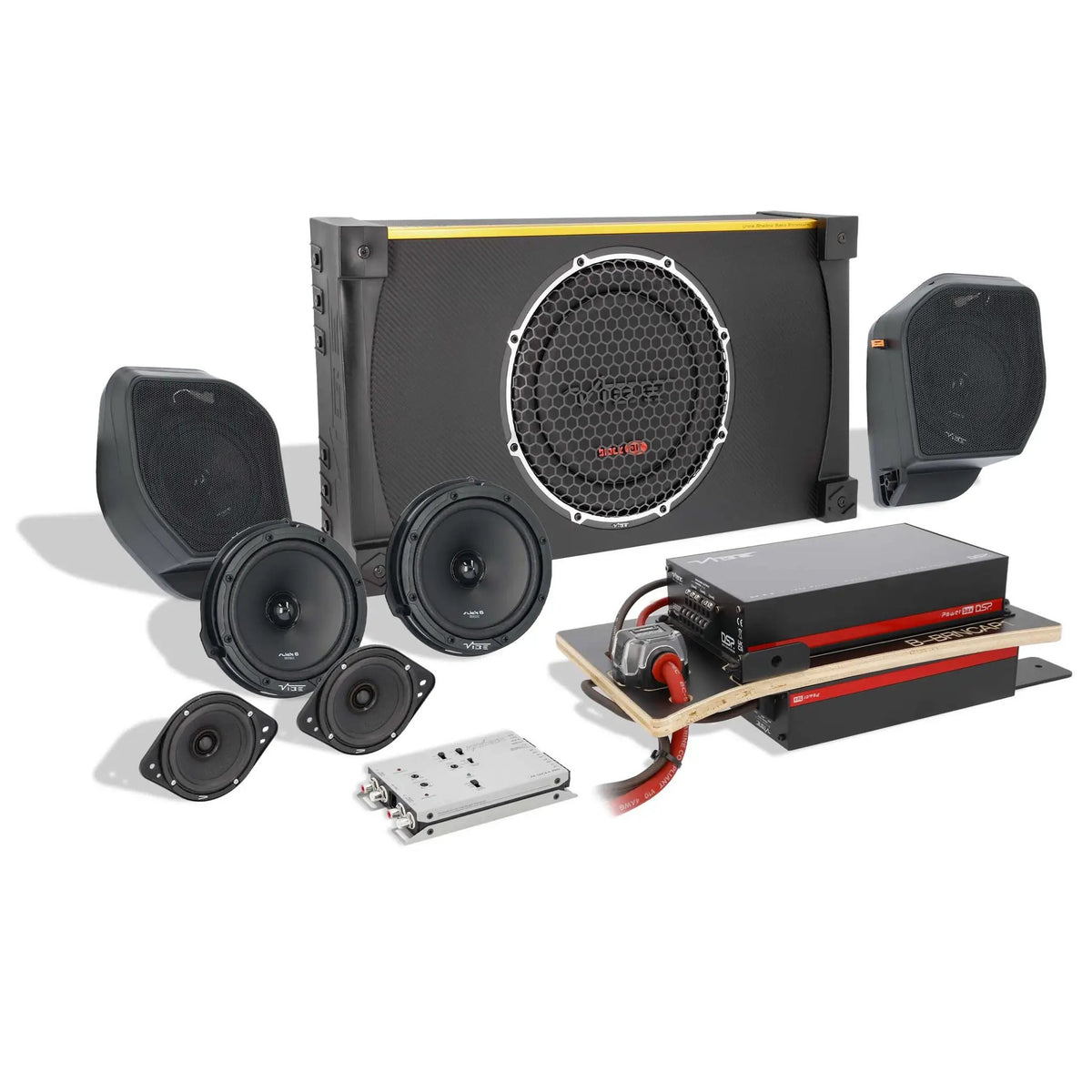 Audio kit with a grille-covered VIBE subwoofer enclosure, speaker pods, loose speakers and a wired amplifier panel