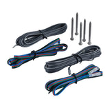 Coiled black and multicolor speaker leads with connectors and mounting screws