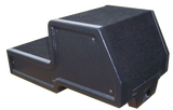 Black stepped subwoofer enclosure with a side terminal cup, angled rear view