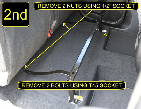 Fox Box Colorado/Canyon installation photo marking the two nuts and two bolts to remove from the under-seat bracket
