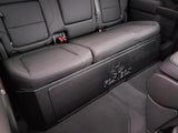 Fox Box enclosure fitted beneath a rear bench seat, with its embossed logo visible on the front
