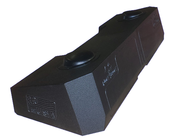 Angled view of a long black Fox Box enclosure with two round raised sections and an embossed flag on the end