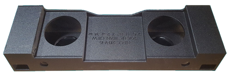 Underside of a Fox Box enclosure showing two recessed speaker openings and side ports