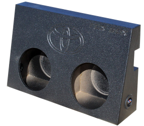 Fox Box enclosure with a Toyota emblem and two empty speaker openings, angled front view