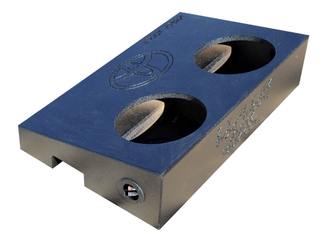 Angled underside of a Fox Box enclosure with two speaker openings, a Toyota emblem and a terminal cup