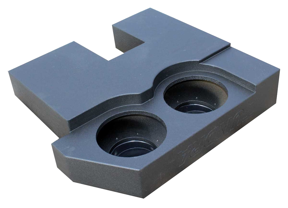 Underside view of a black subwoofer enclosure with two recessed round speaker openings