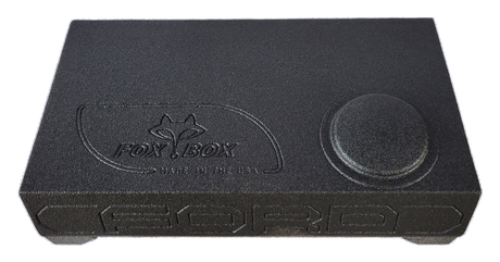 Fox Box enclosure viewed from above, showing the logo and a single raised circular section