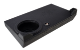 Angled underside view of a Fox Box enclosure with one recessed speaker opening and a terminal cup