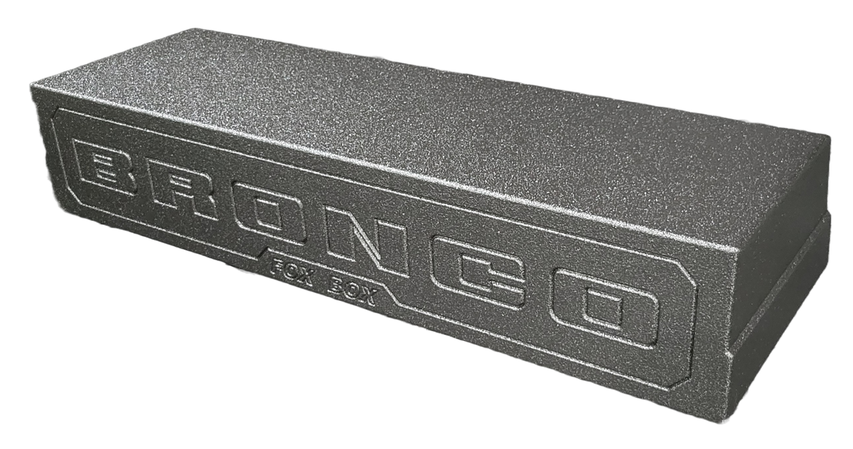 Fox Box enclosure with embossed BRONCO lettering, angled view