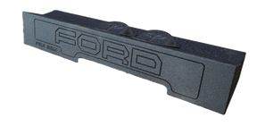 Fox Box enclosure with FORD lettering and two raised circular sections, angled front view