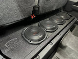 Fox Box Toyota Tundra enclosure installed under the raised rear seat with four subwoofers fitted