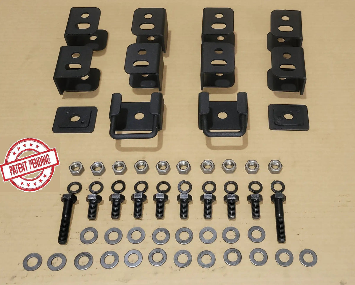 Seat-lift brackets, spacers, bolts, nuts and washers arranged in rows