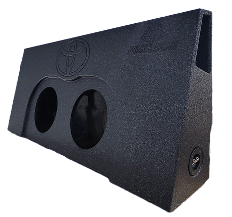 Wedge-shaped subwoofer enclosure with two speaker openings, a Toyota emblem and side port