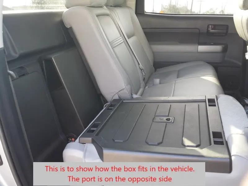 Rear-seat installation reference with one seat folded, noting that the enclosure port is on the opposite side
