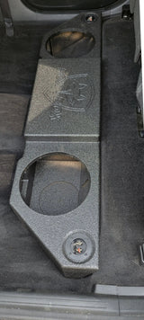 Overhead view of a Fox Box enclosure with two empty speaker openings fitted on the rear cabin floor