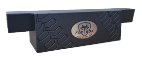 Fox Box subwoofer enclosure with a tire-tread pattern and central logo, front view