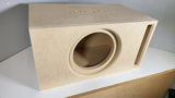 TRU SPEC enclosure on a workbench, angled view of its round front cutout and vertical slot port
