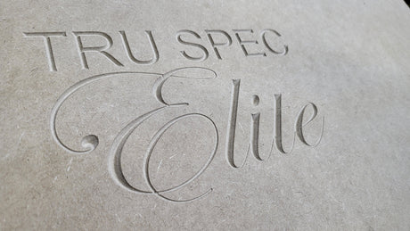 Close-up of the TRU SPEC Elite name engraved into an enclosure panel