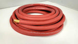 Coiled red TRU SPEC power wire with exposed copper strands at its cut end