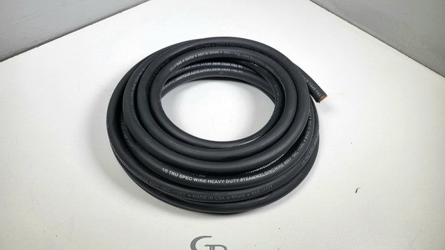 Coil of black TRU SPEC wire with printed jacket lettering and a cut end