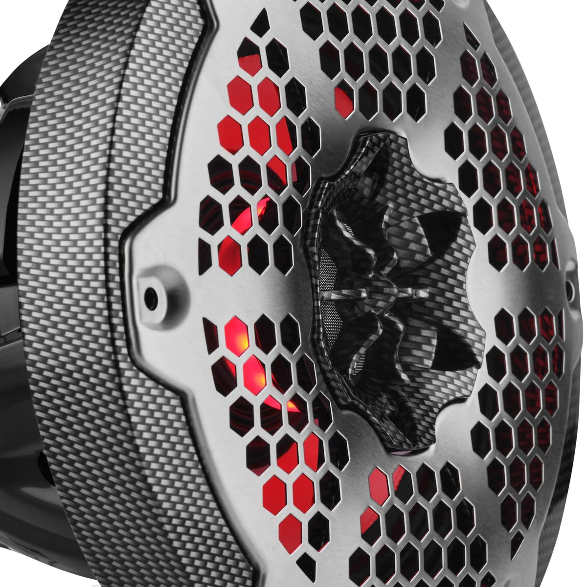 Close-up of a carbon-pattern speaker frame, silver honeycomb grille and red illumination