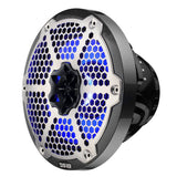 Angled front view of a carbon-fiber-patterned DS18 speaker with a silver honeycomb grille and blue lighting