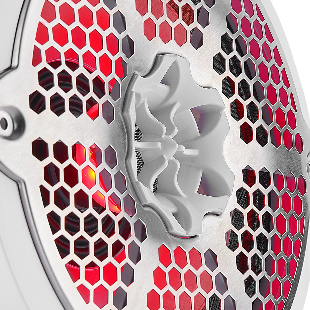 Close-up of a white DS18 speaker's central tweeter and honeycomb grille with red illumination