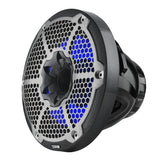 Angled view of a carbon-fiber-pattern DS18 speaker with silver honeycomb grille and blue illumination